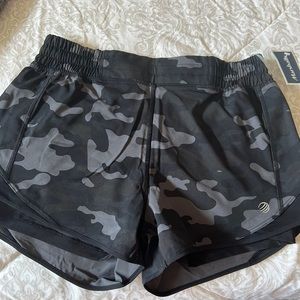 Never worn Black Camo athletic shorts.